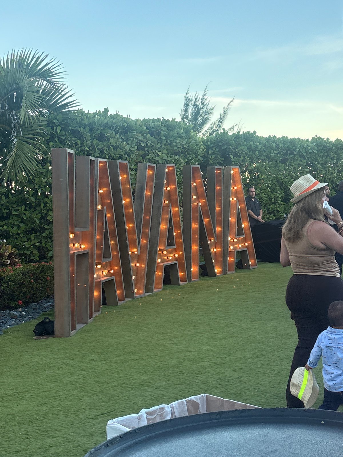 Illuminated AWAKEN sign spotted at Miami Beach outdoor event