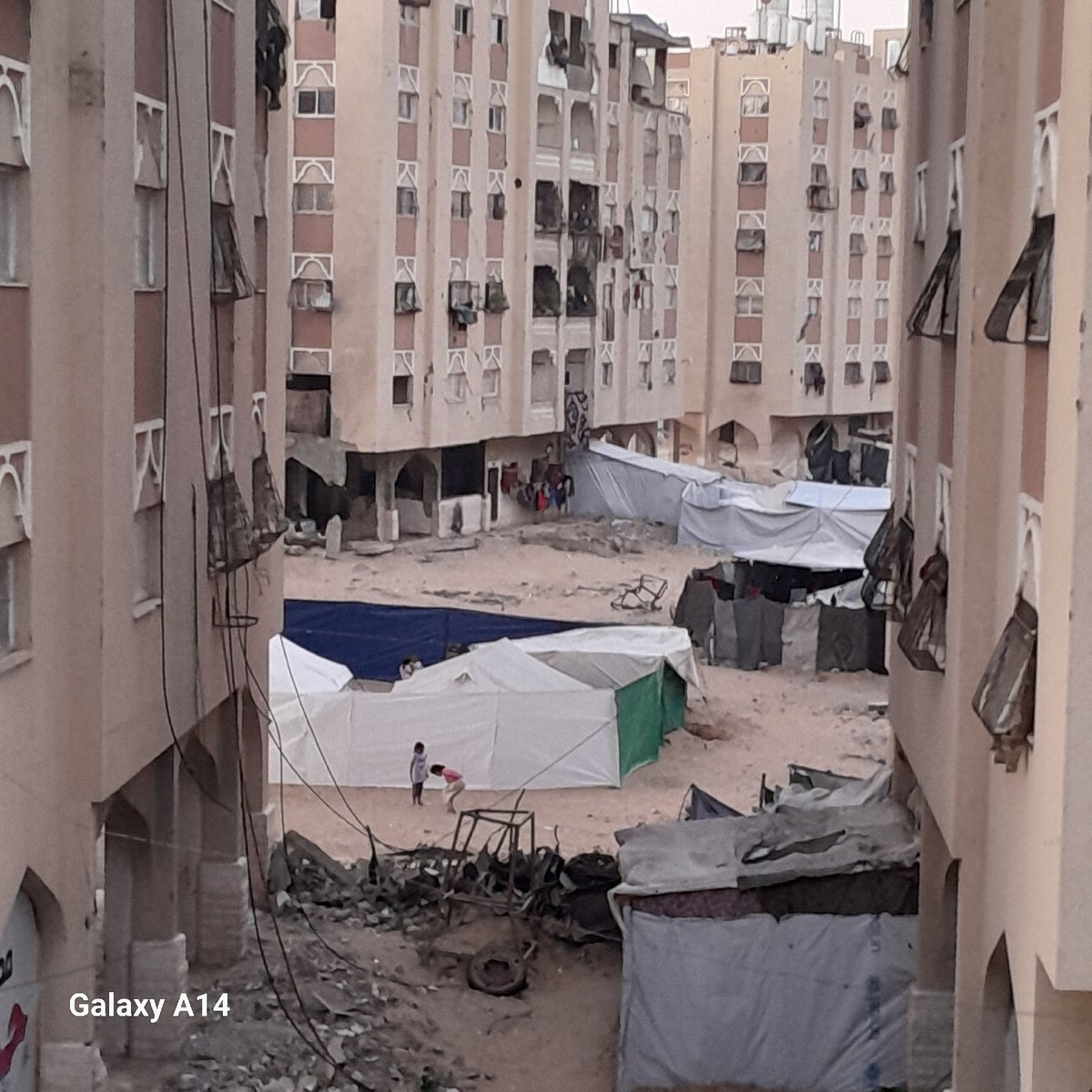 Children play in Khan Yunis streets amid ongoing displacement
