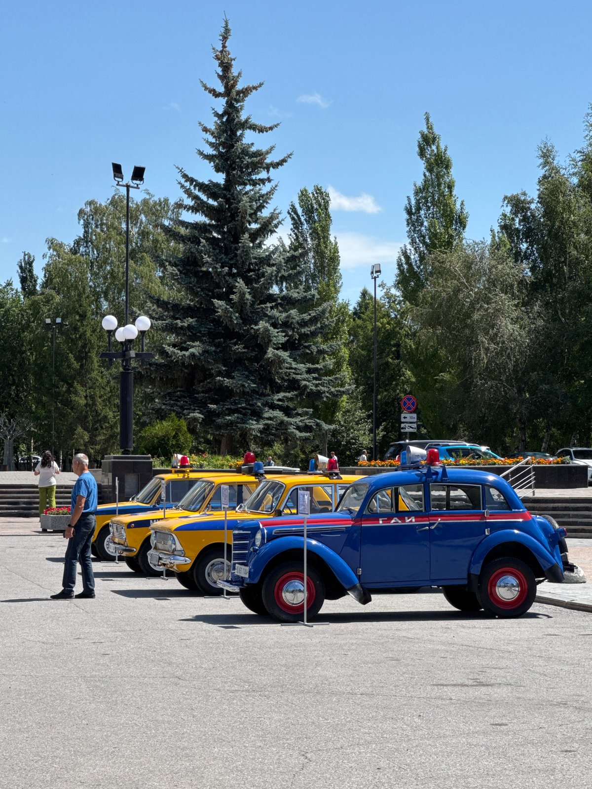 Vintage cars and retro police motorcycle on display in Omsk