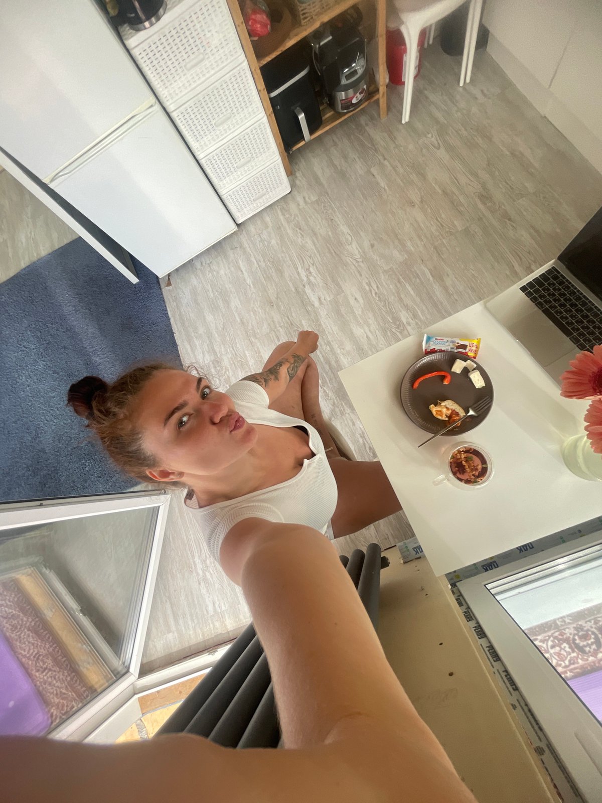 Woman's morning routine captured in Russian industrial district