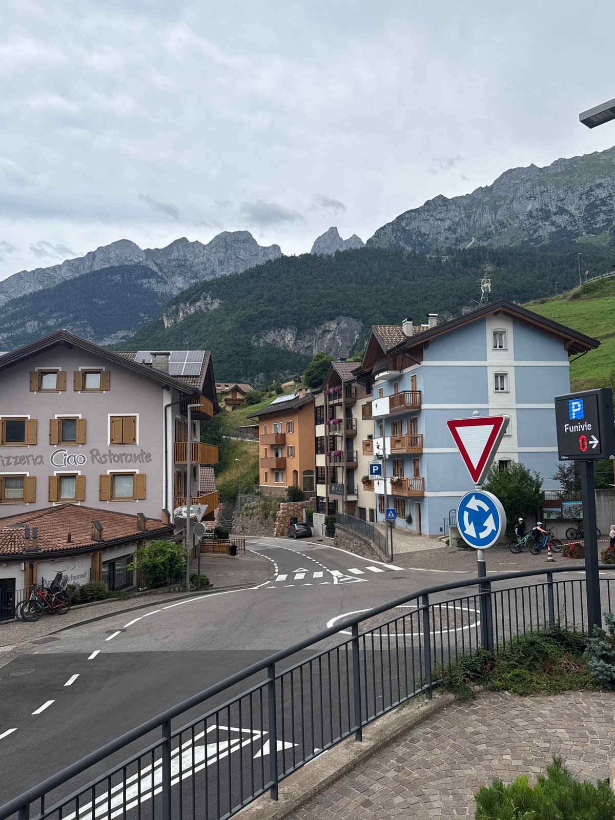 Summer morning around Molveno's lake, trails, and cable cars