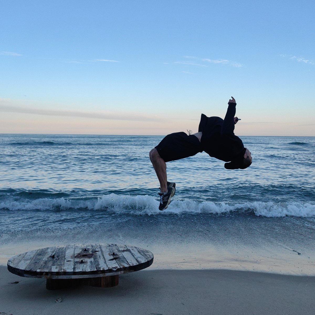 Athlete performs backflips, jumps on Varna beach near Black Sea