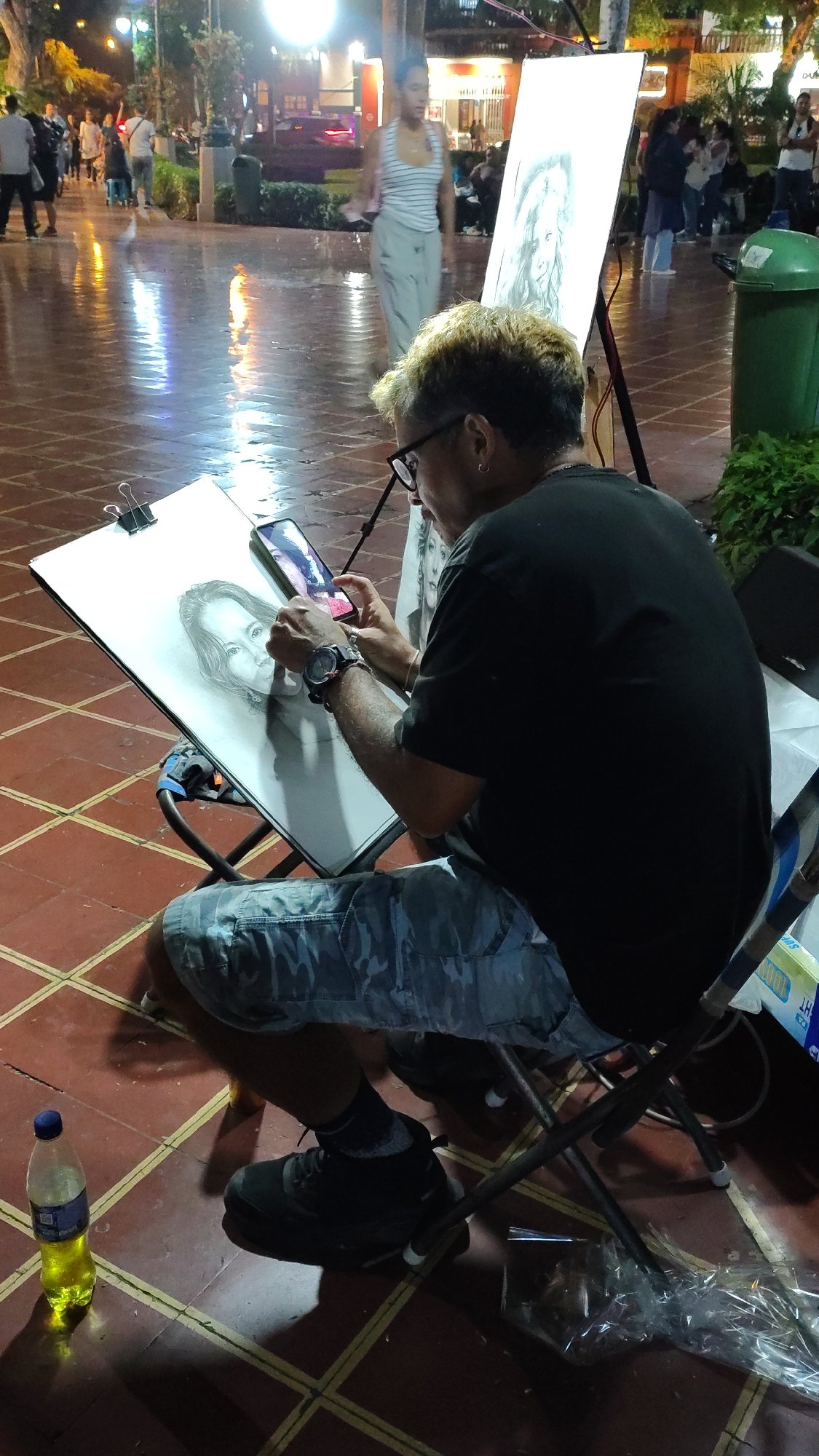 Artist photographs in Barranco public space during early morning
