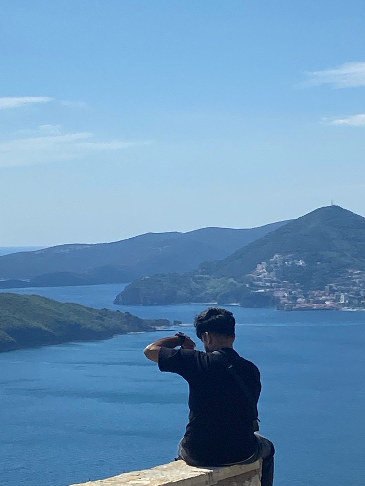 Clear skies observed over Montenegro coast from elevated viewpoint