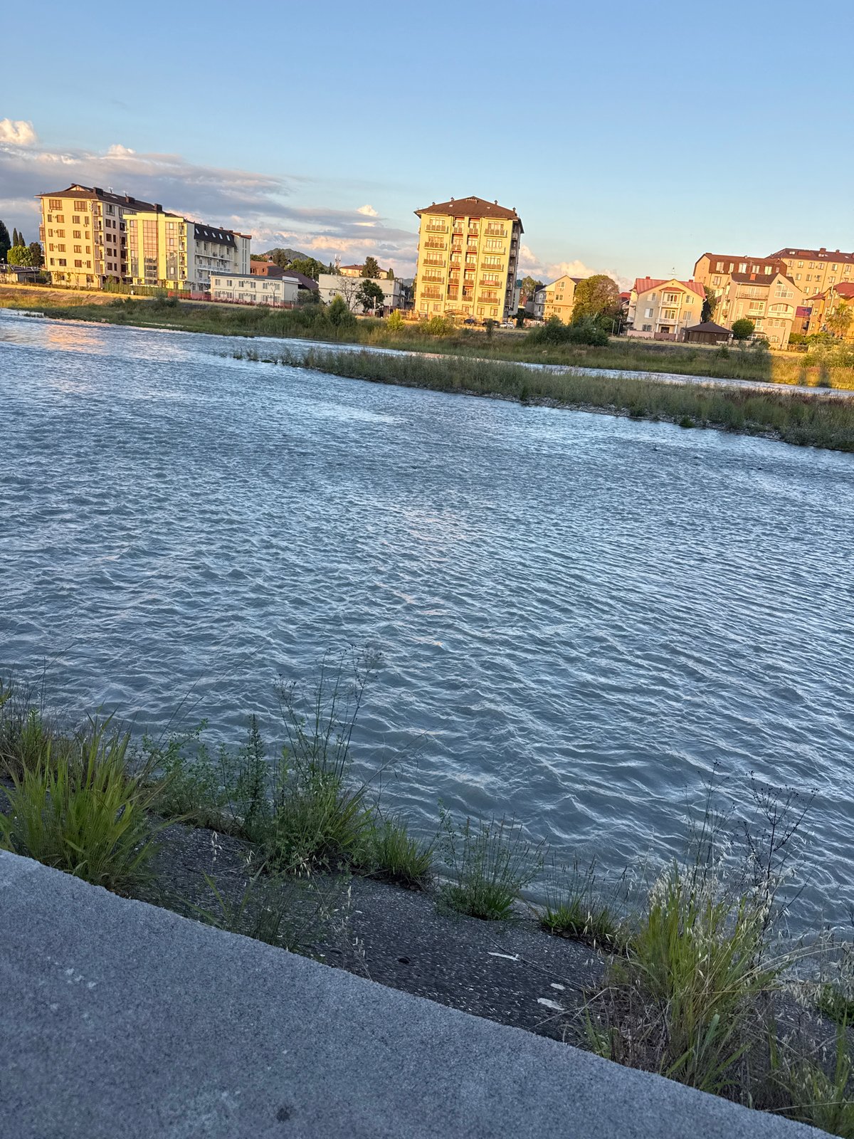 Golden hour along Sochi's Mzymta River promenade