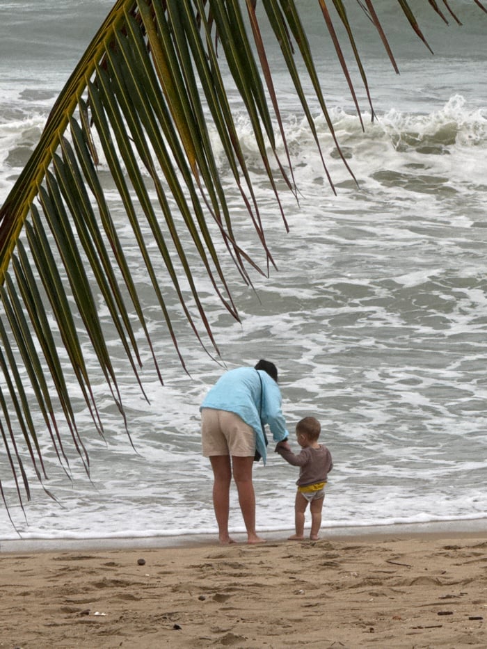 Overcast morning beach activity observed in Nha Trang, Vietnam