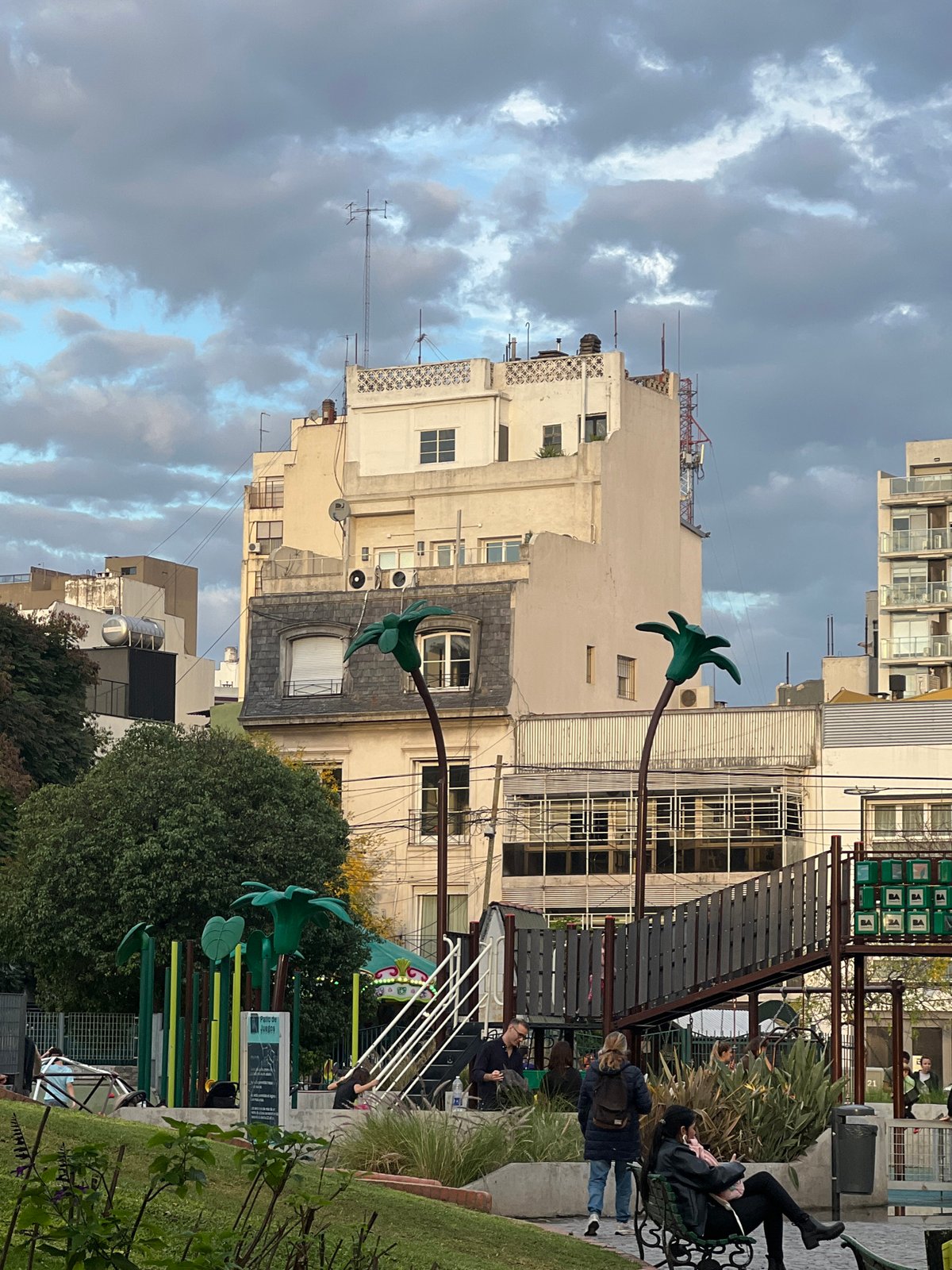 Evening cityscape captured in Buenos Aires with artificial palms