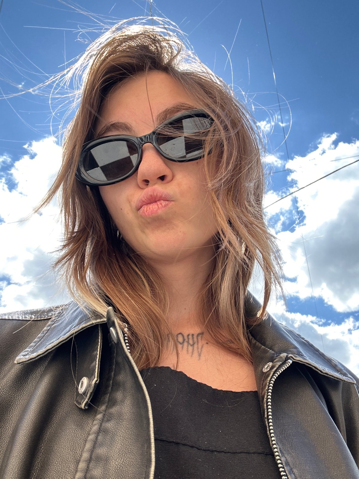 Selfie session in Moscow under a bright summer sky