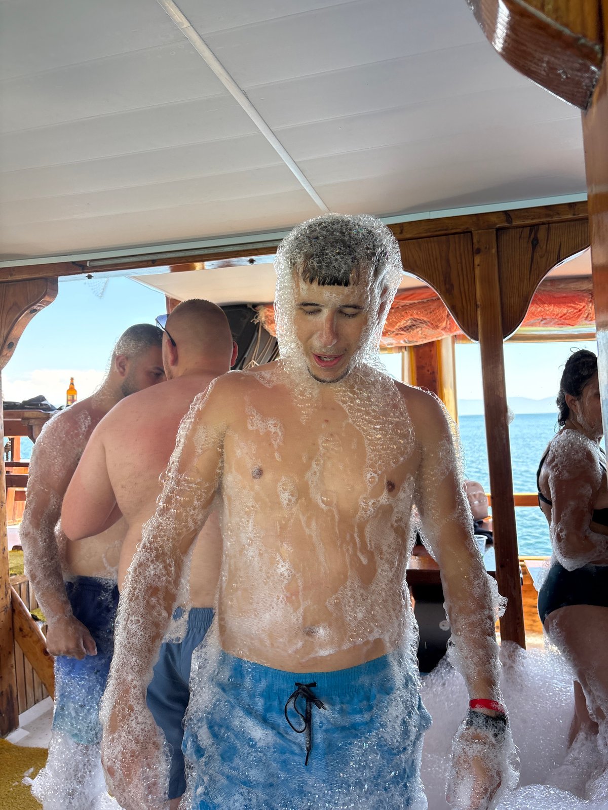 Foam party aboard boat in Menderes, Turkey draws young revelers