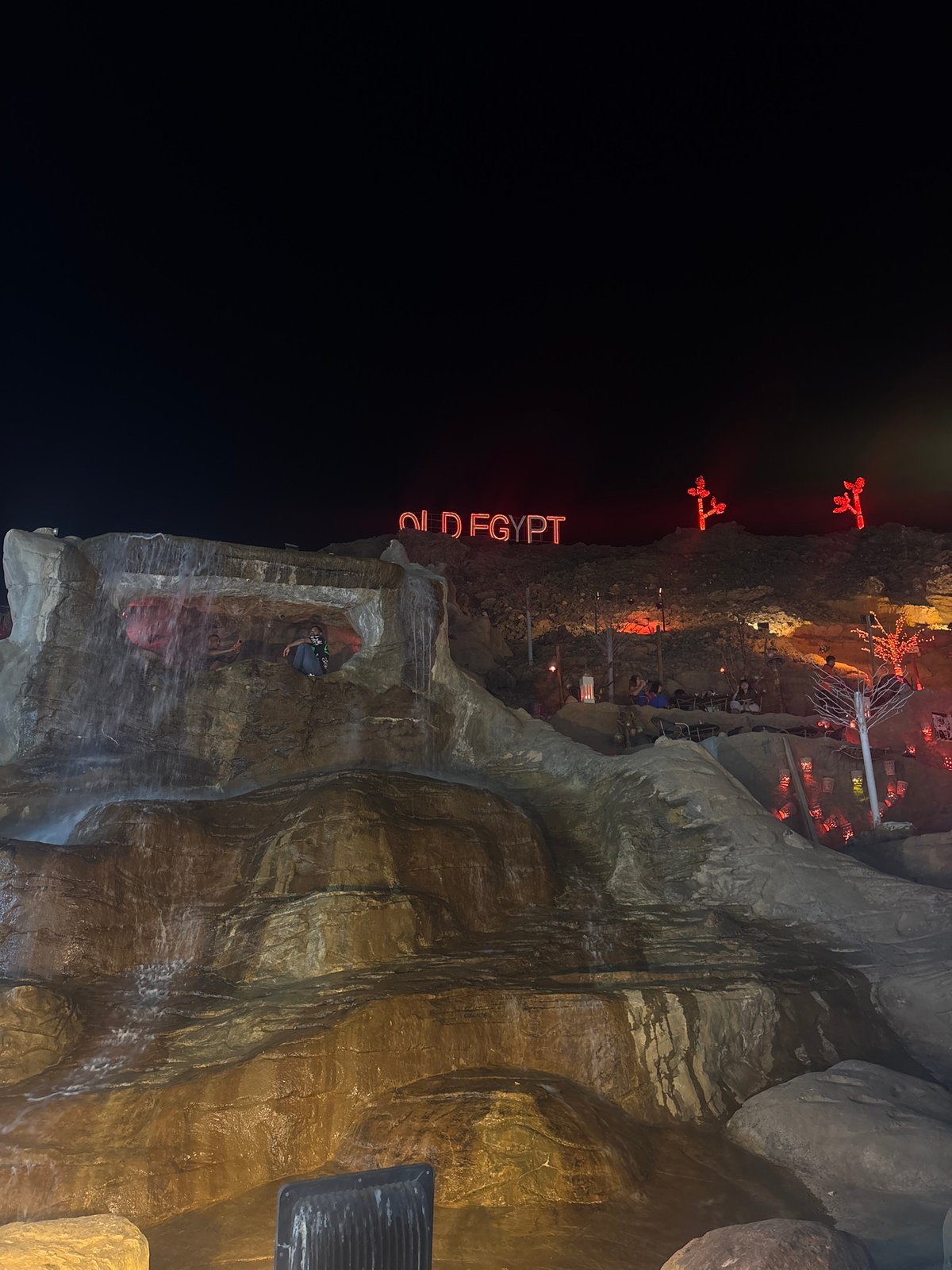 Neon 'Old Egypt' signs illuminate Sharm El Sheikh establishment