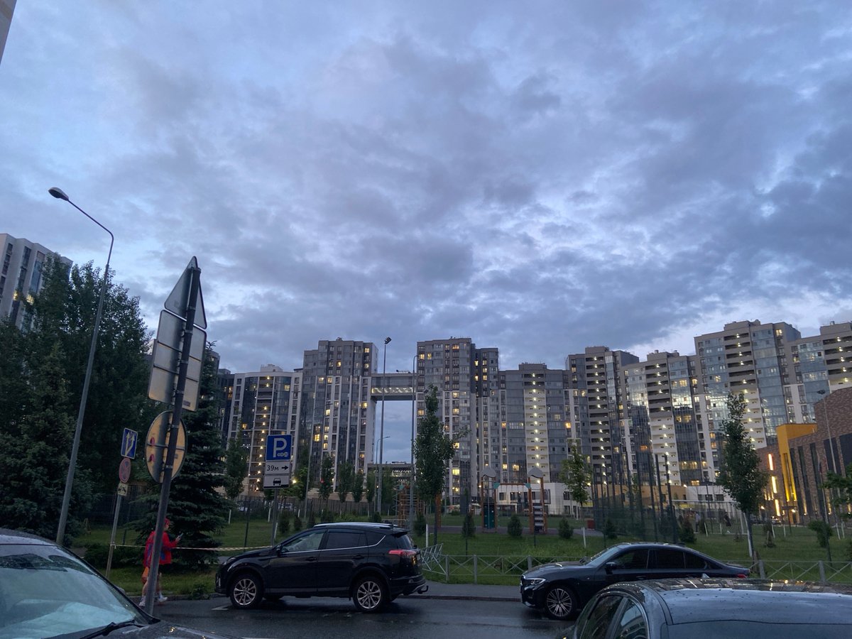 Urban scenes documented during evening hours after rainfall