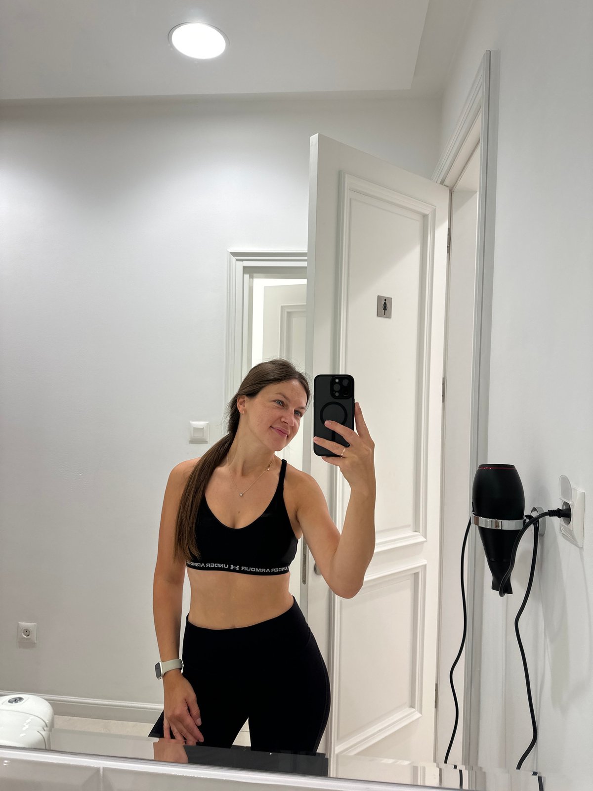 Woman takes workout selfies in Montenegro bathroom