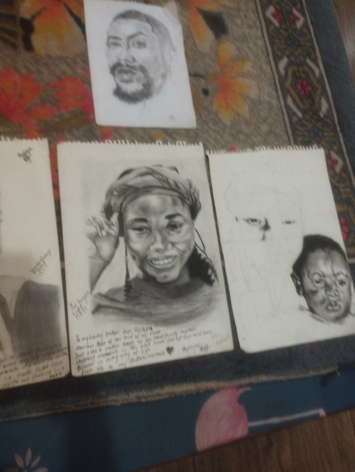 Portrait sketching session with charcoal drawings in Jos, Nigeria