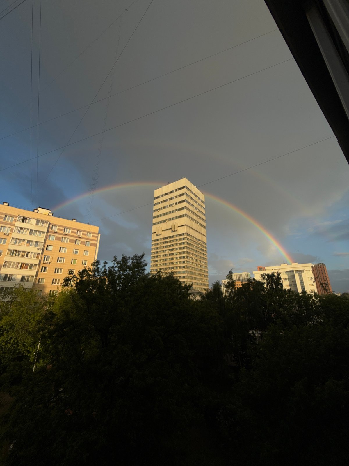 Double rainbow appears over Moscow apartment buildings