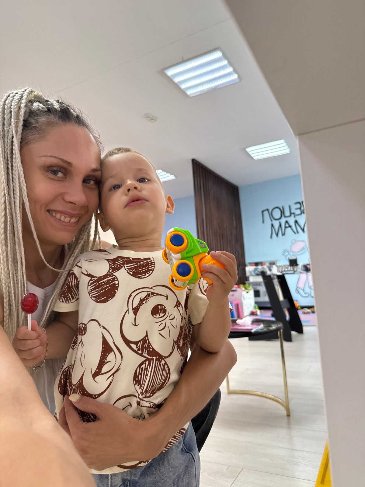 Air hockey and selfies at a family play space in Rusanovo