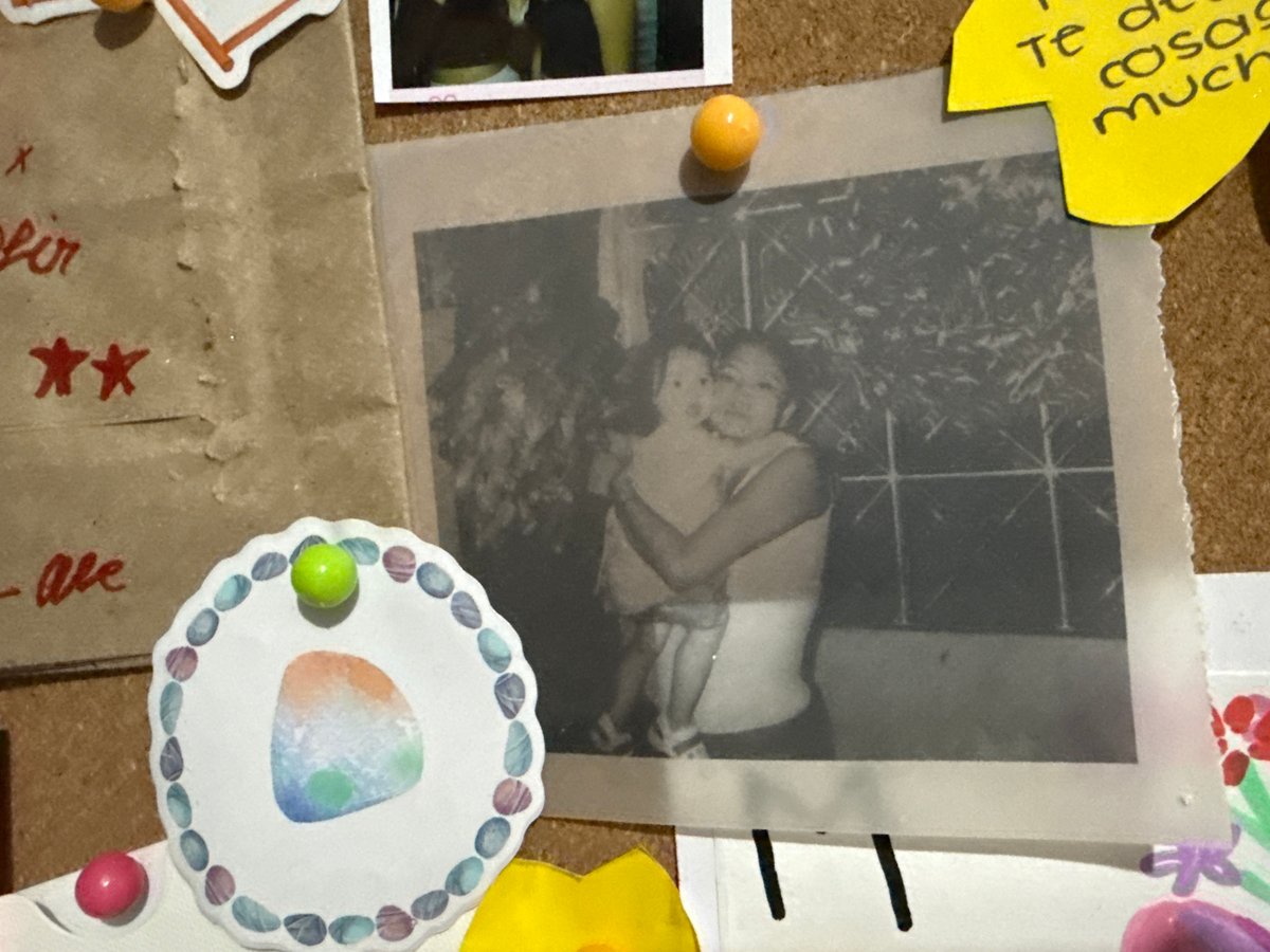 Bulletin board displays family photograph in Puebla, Mexico