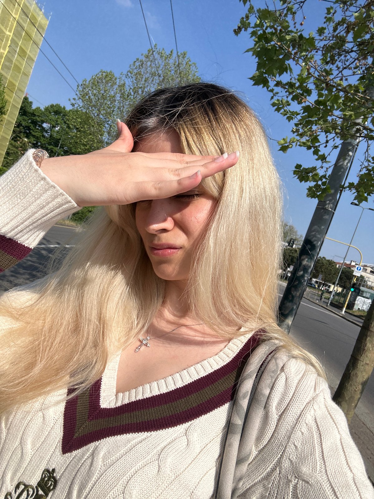 Woman photographed in sunny Milan street portrait session