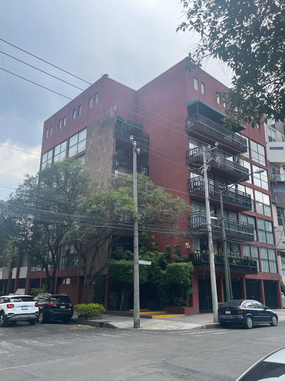 Residential building documented in Mexico City street scene