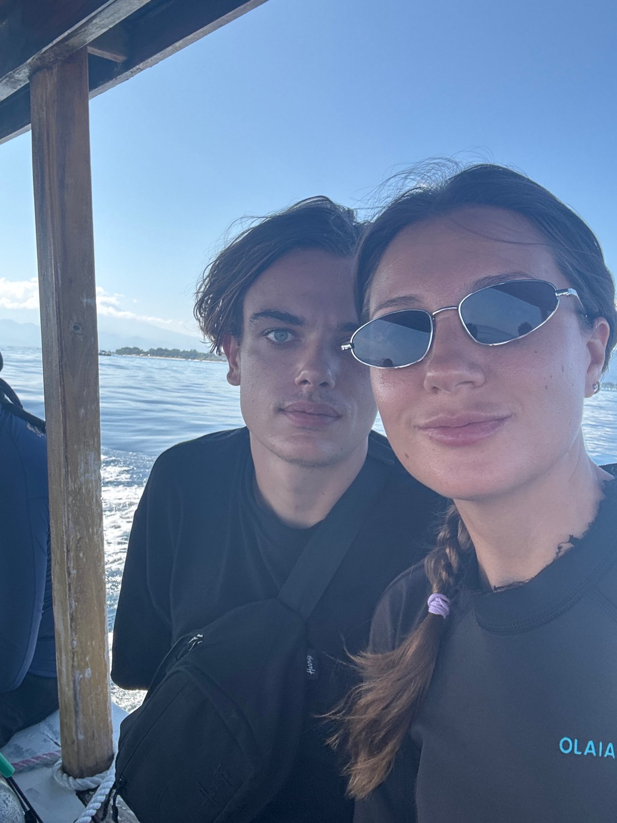 Couple takes selfies on boat in Indonesian waters
