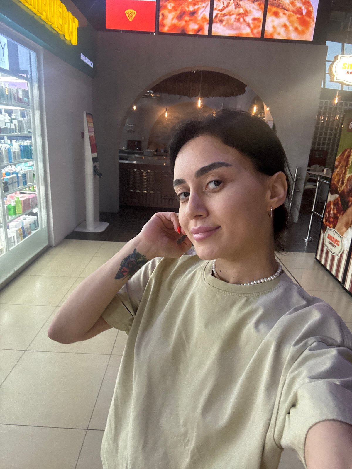 Selfie stop at a busy Argveta truck stop on a rainy day