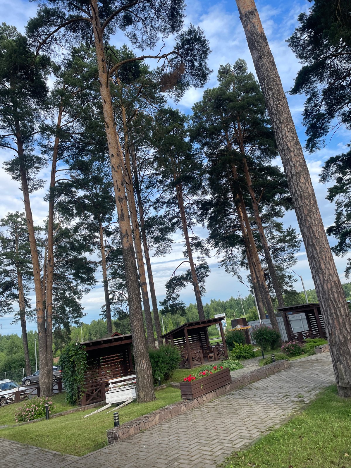 Afternoon hangout in a Votkinsk parking lot under dramatic skies