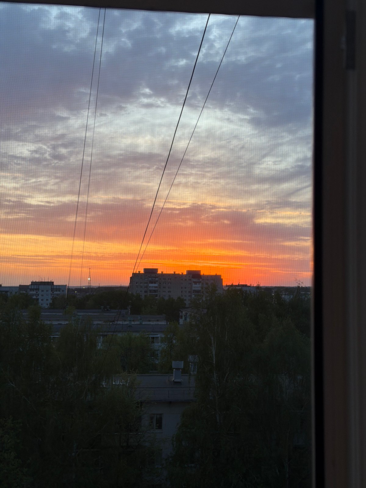 Sunset sequence documented over Chaikovsky, Russia cityscape