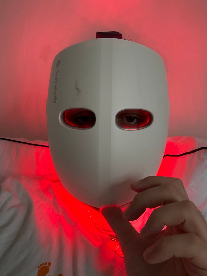 London resident documents personal wellness routine with therapeutic face masks