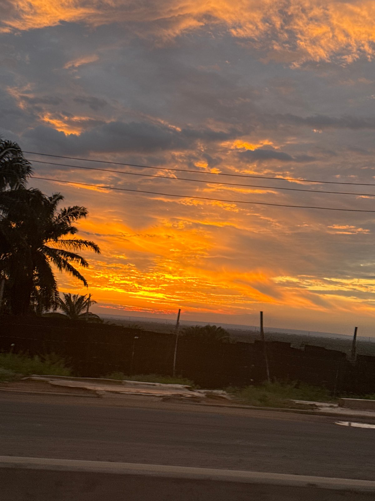 Sunset over Orifite, Nigeria with orange and yellow skies