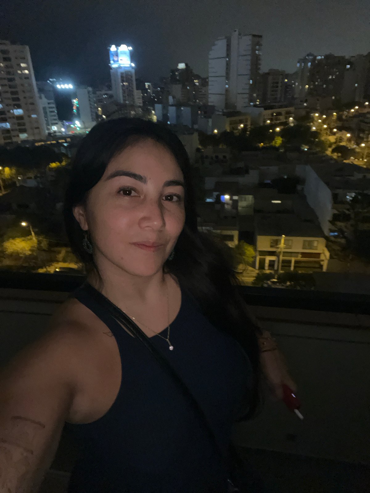 Nighttime scenes captured across Miraflores district rooftops and cityscape