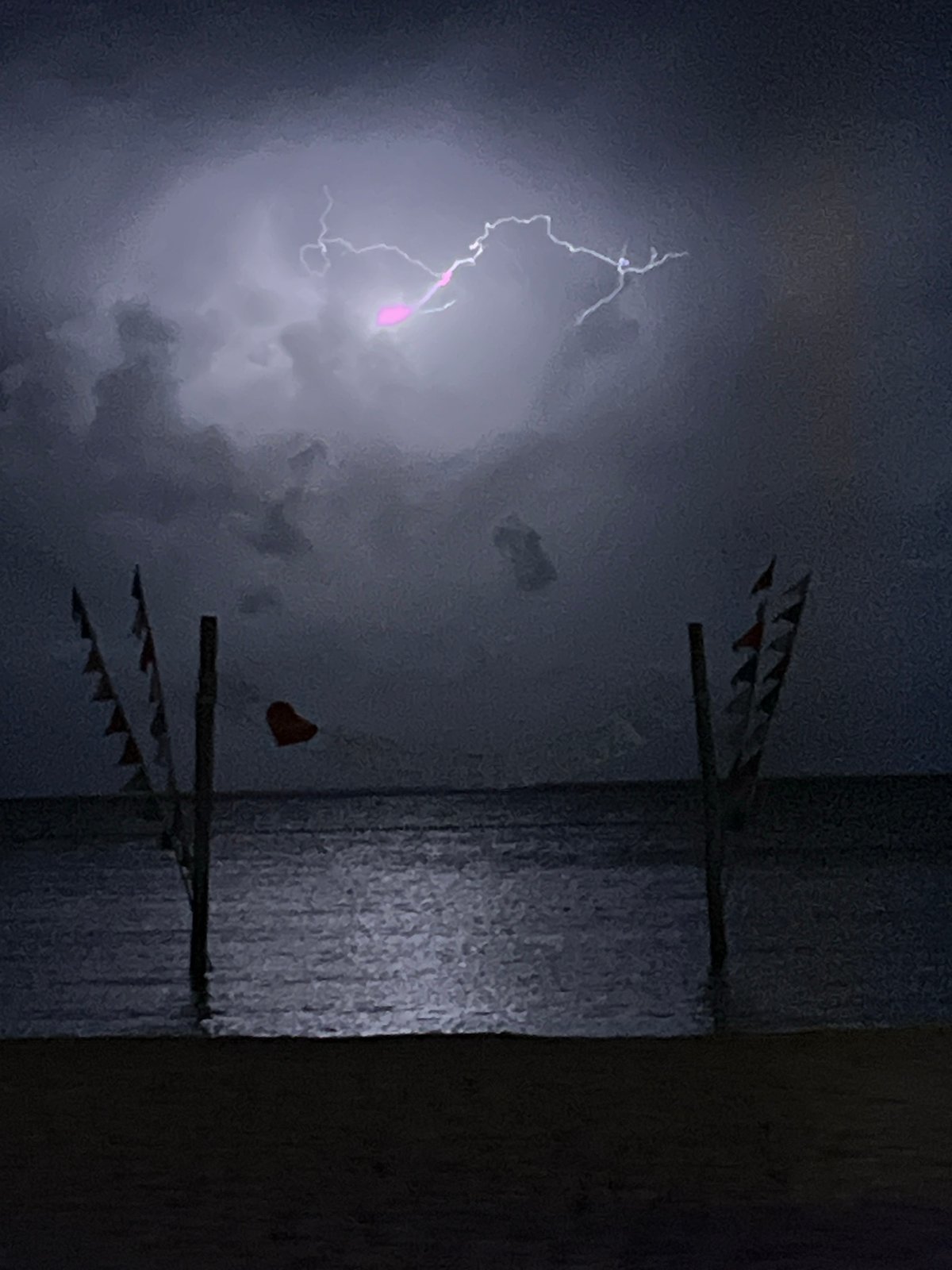Lightning strikes captured over Ko Phangan beach during storm