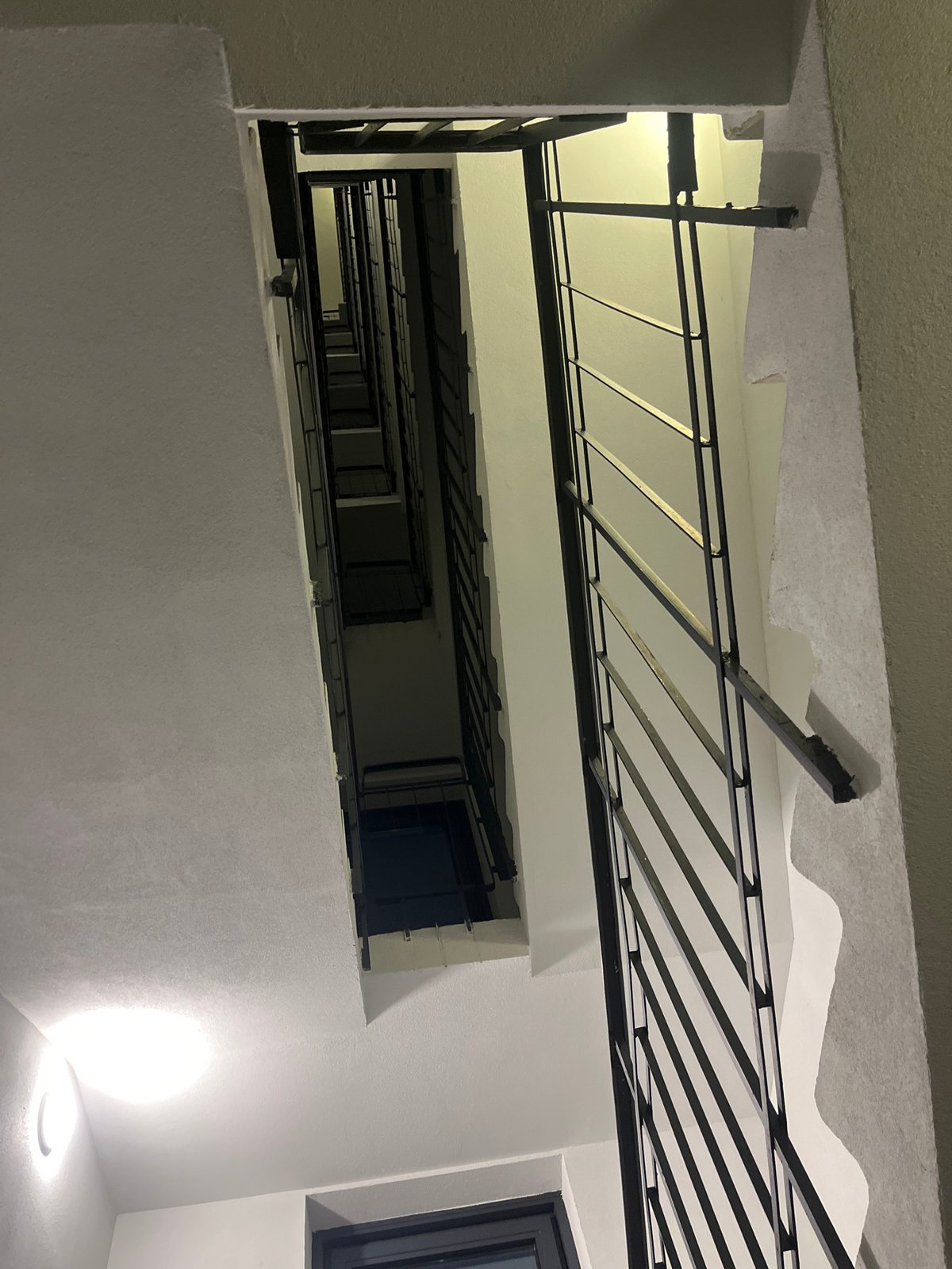 Resident documents evening routine in Saint Petersburg apartment building
