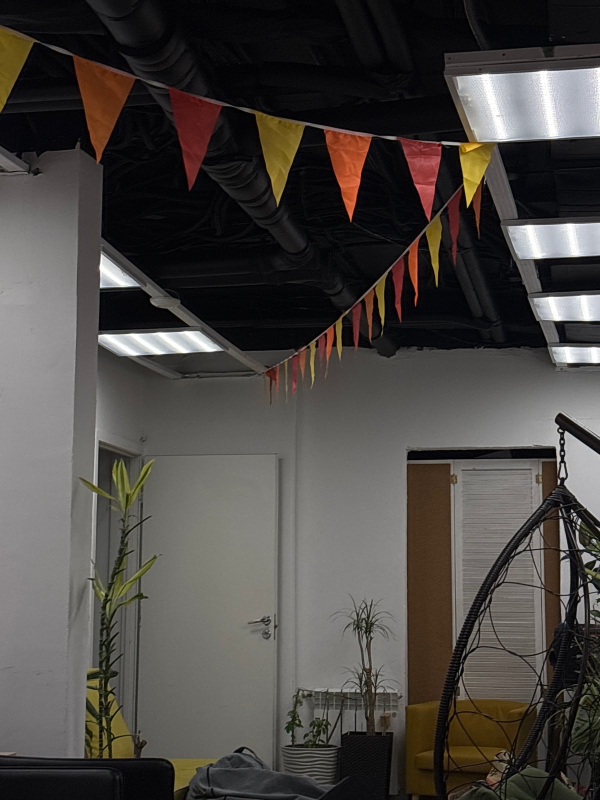 Office space in Kazan decorated with colorful pennant flags