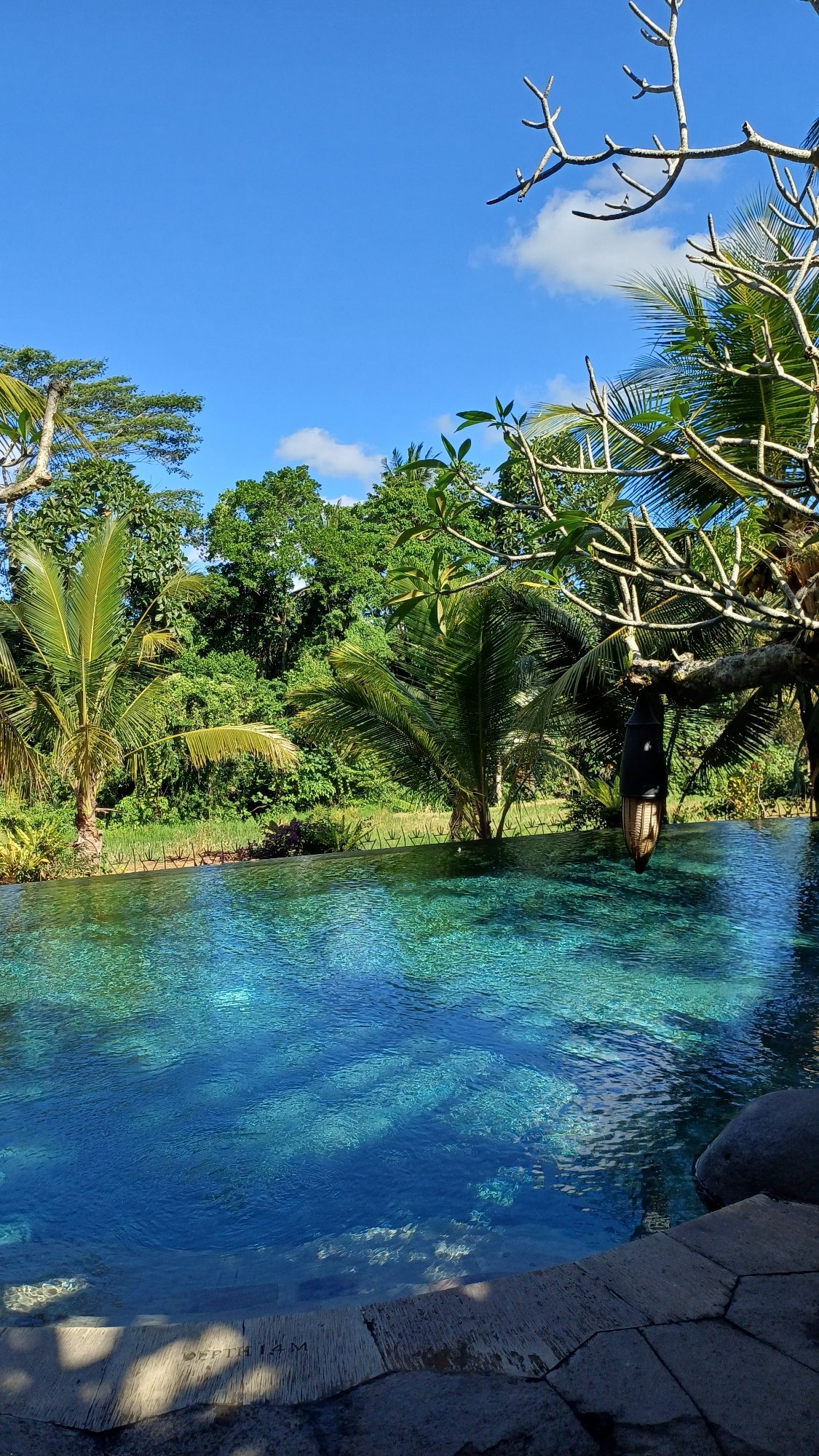 Traditional Balinese architecture and pool facilities documented in Ubud