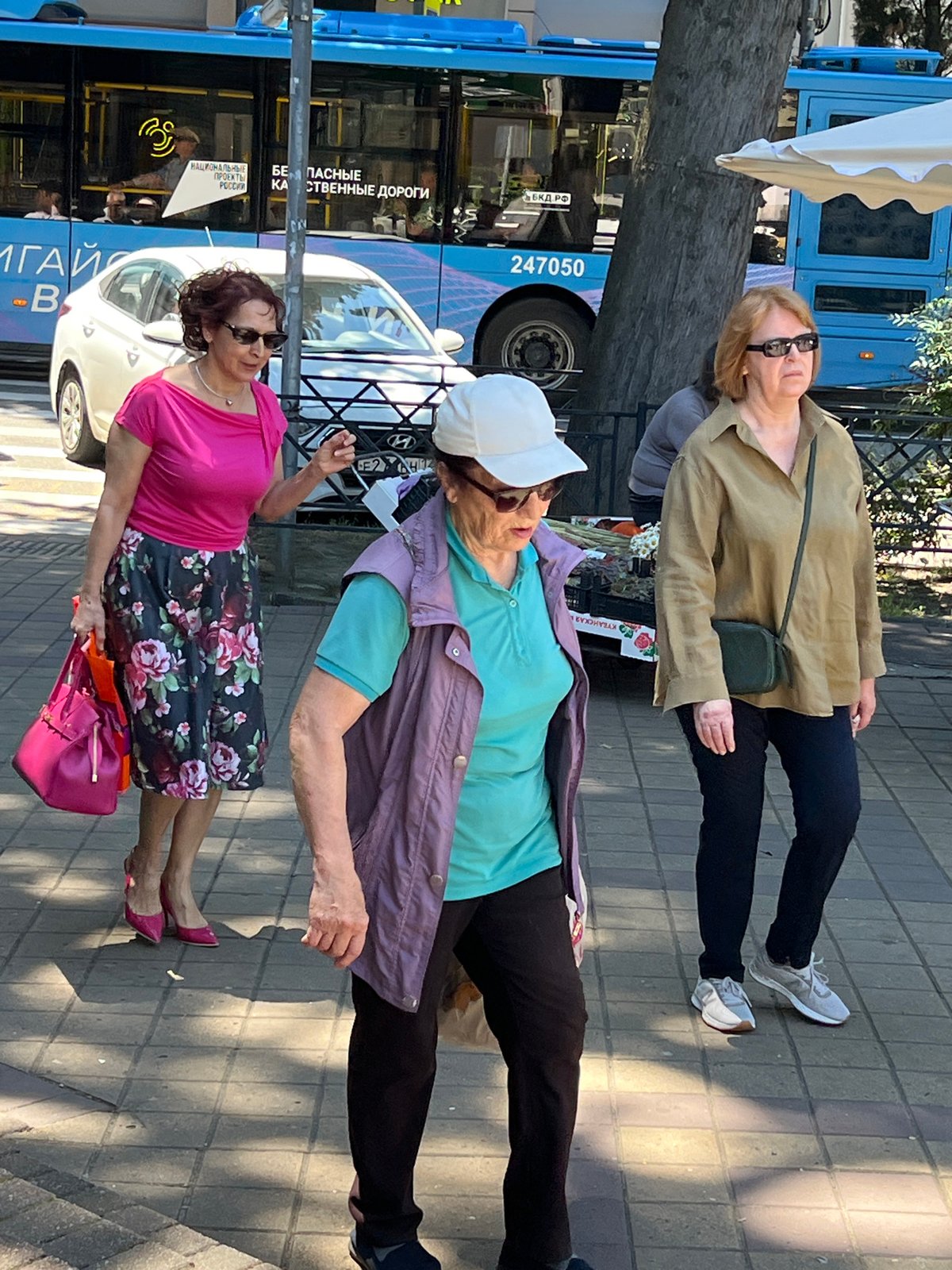 Morning street life documented across downtown Sochi markets and sidewalks