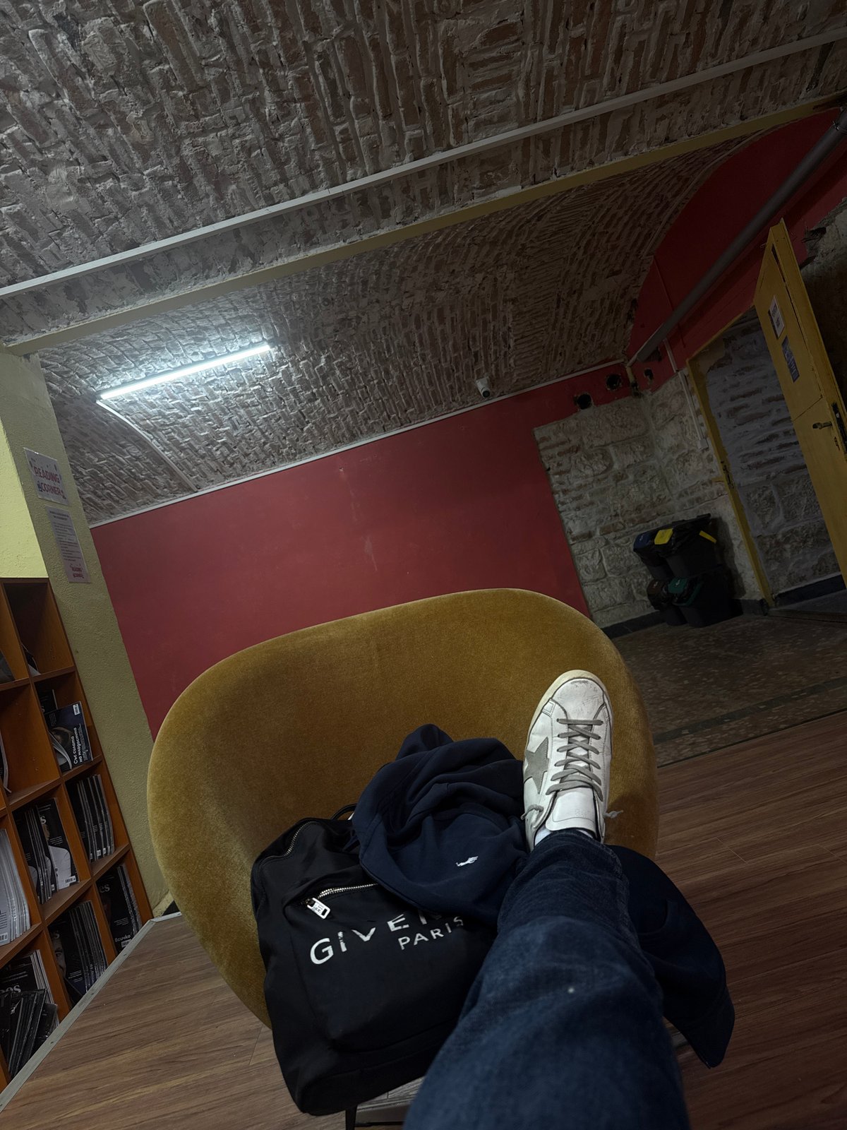 Person waits in indoor common area in Ruse, Bulgaria