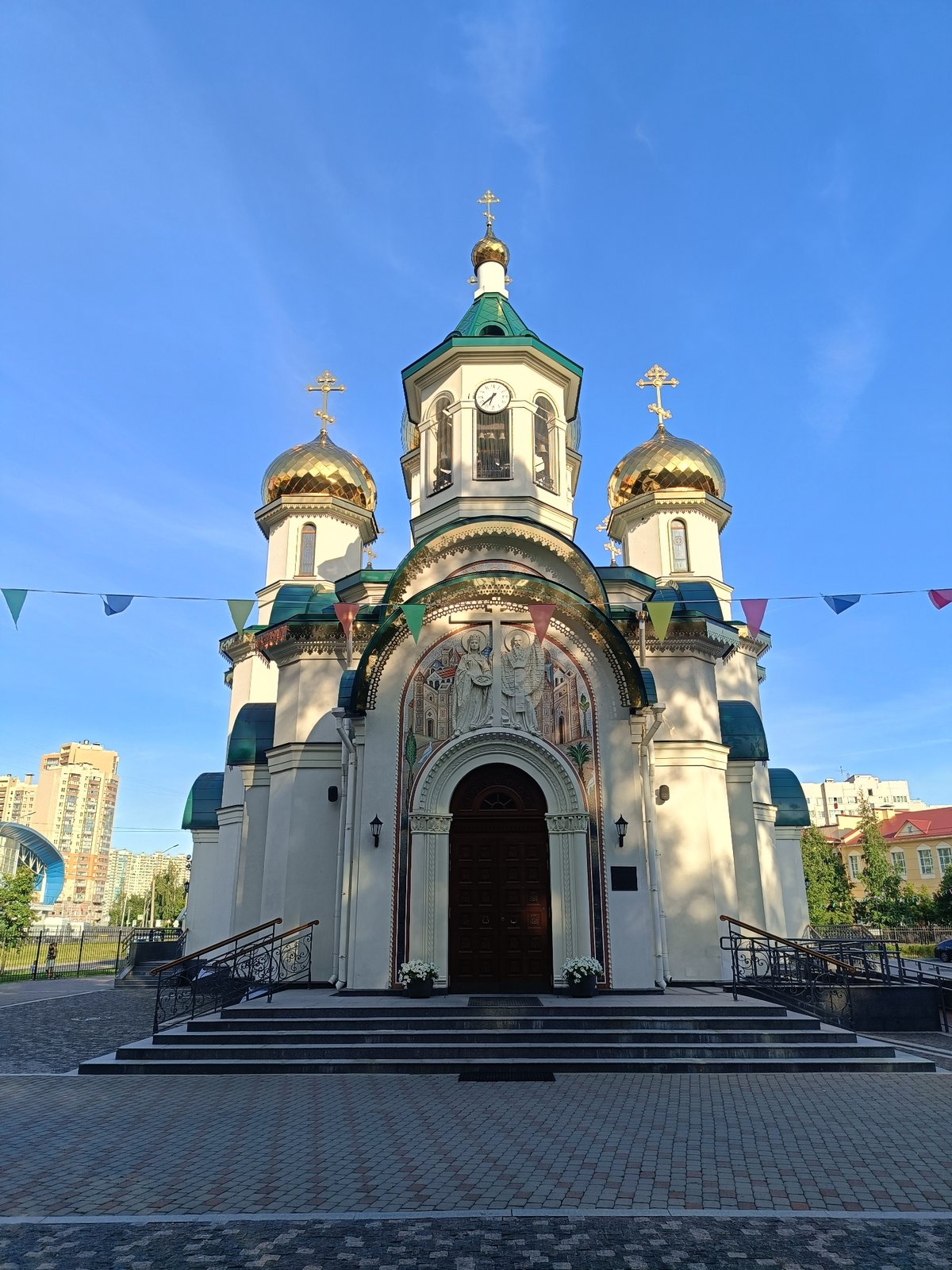 Saint Petersburg's Orthodox churches, golden domes gleaming on a sunny day