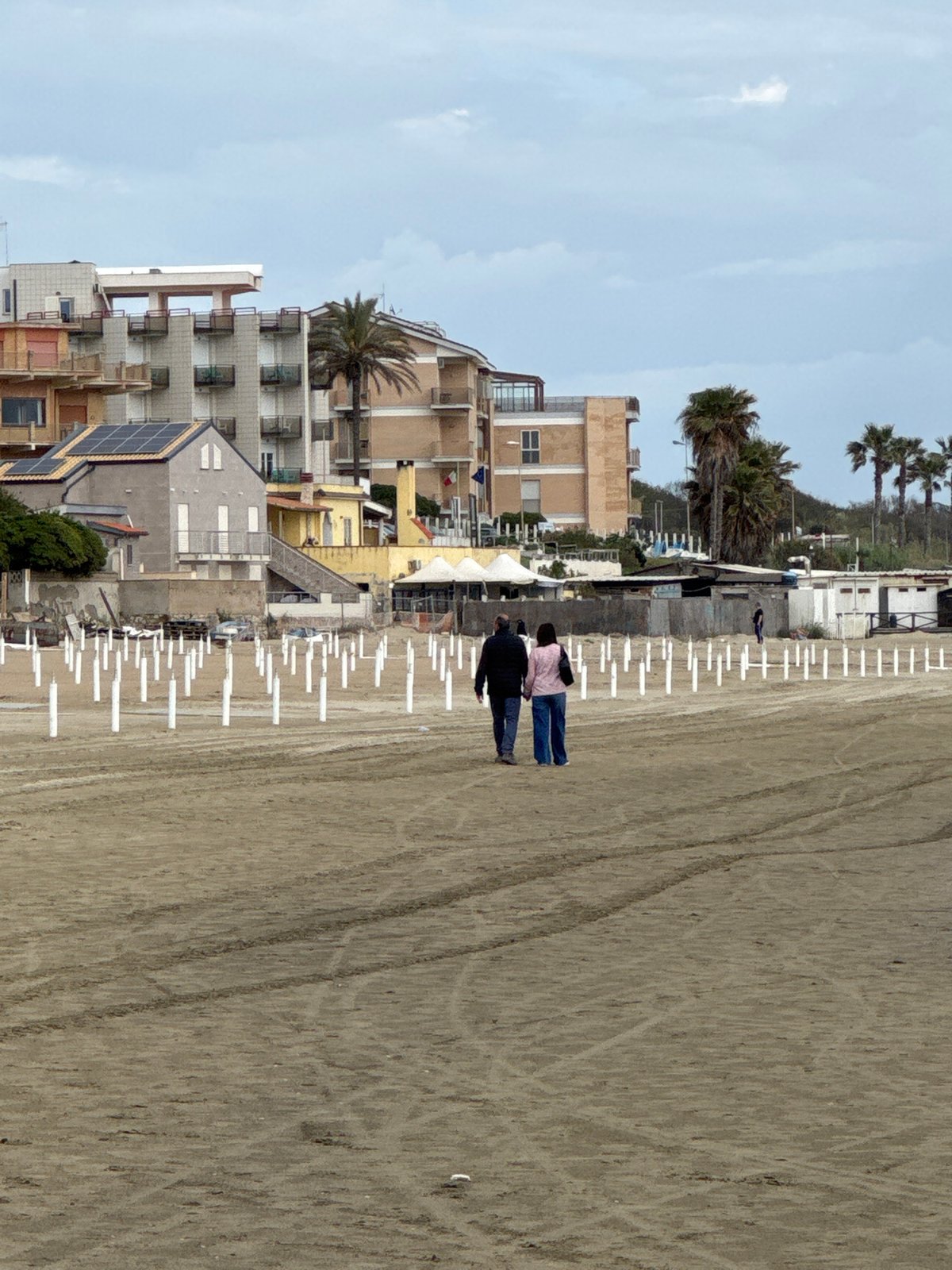 Afternoon beach life documented in Nettuno, Italy