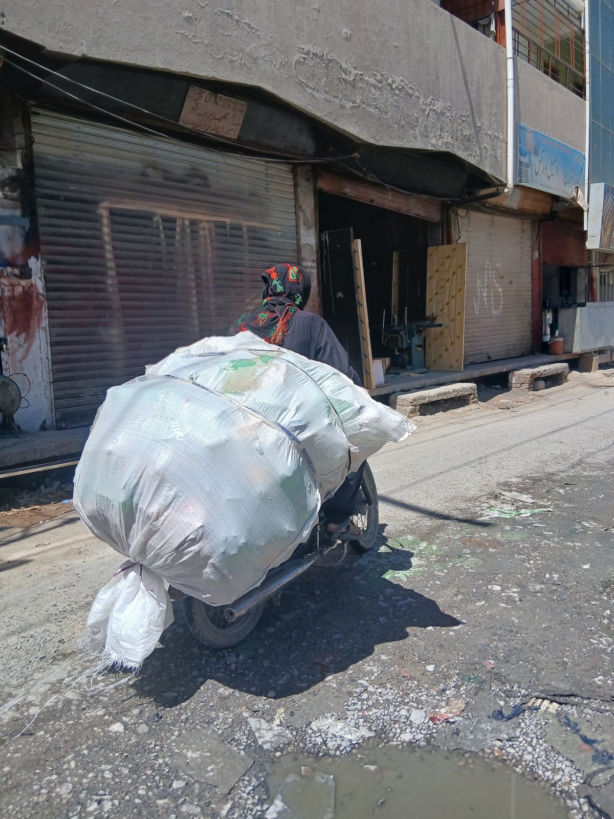 Morning street life documented in Quetta's urban quarters