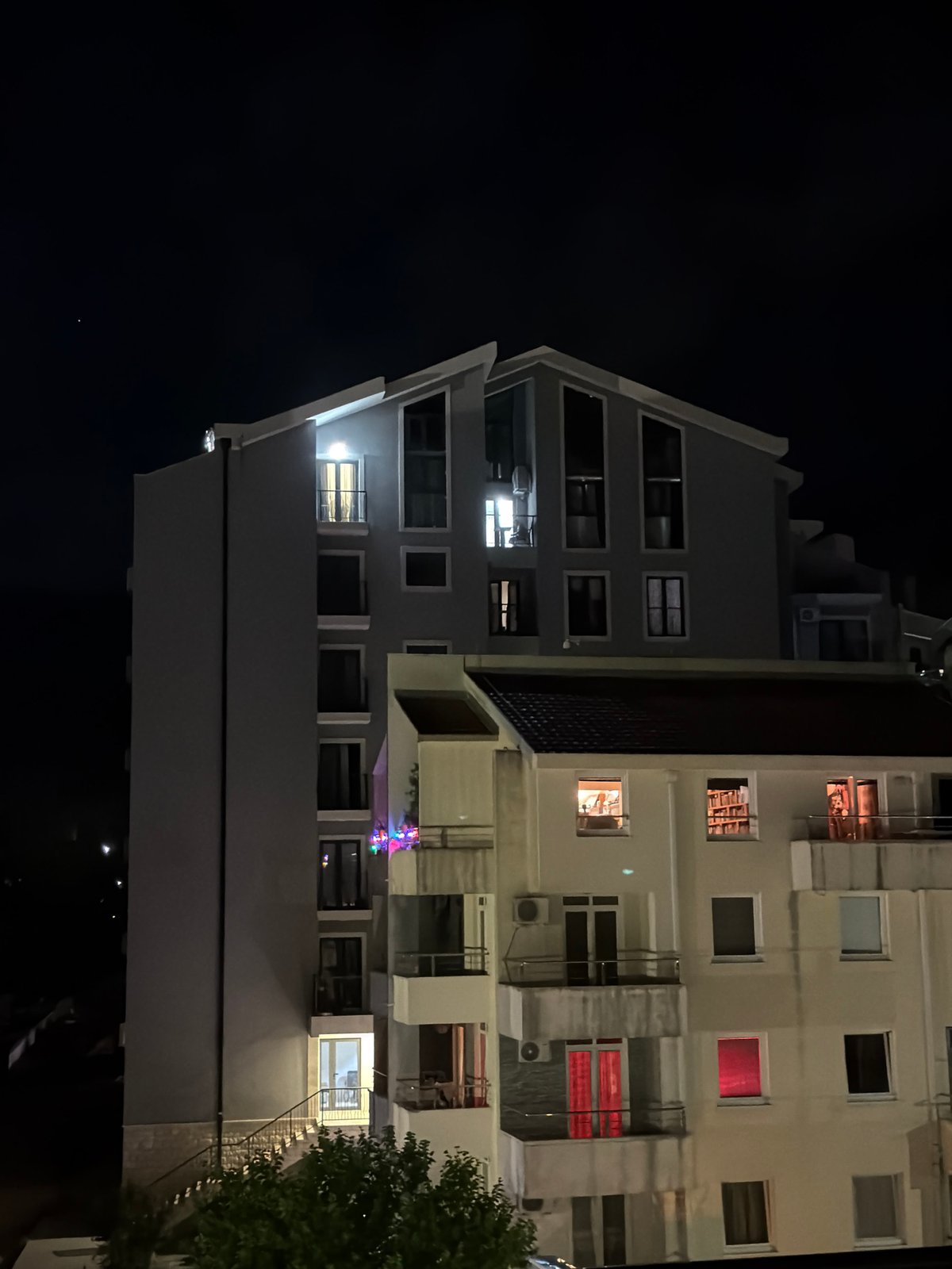 Evening lights illuminate buildings in Budva Montenegro