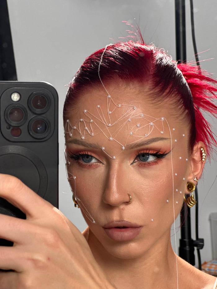 Red-haired woman conducts portrait session in Dalung, Indonesia