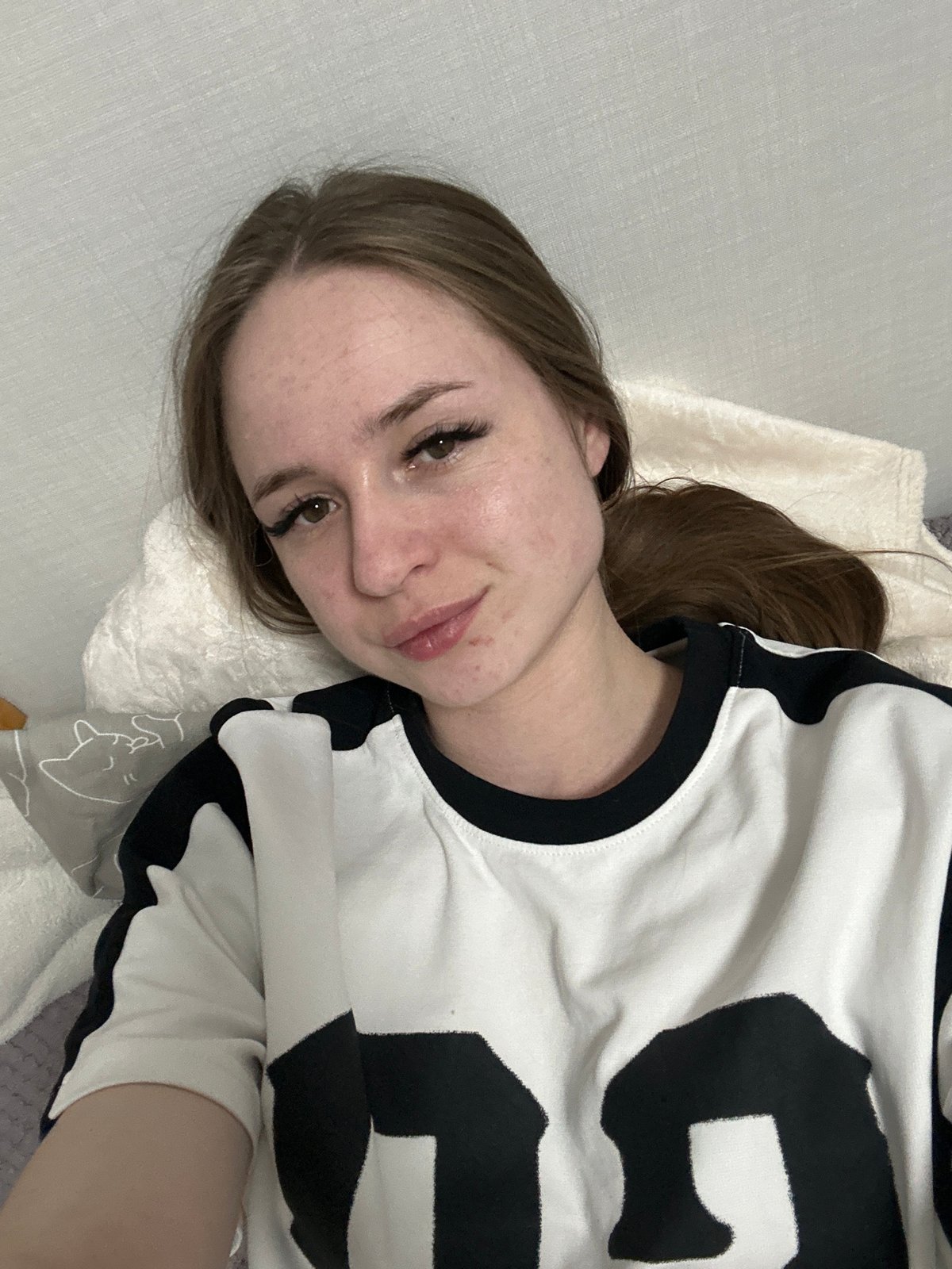 Woman photographed lying indoors from multiple angles