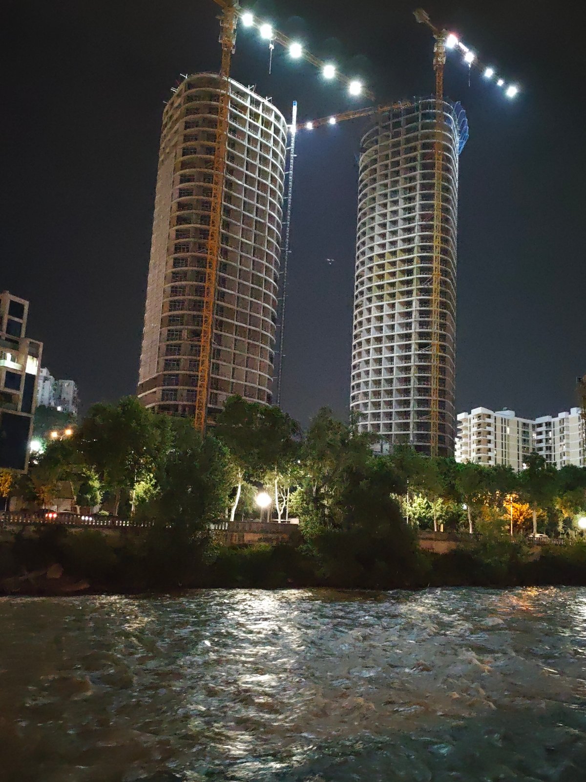 Tbilisi at night: old apartments, new towers, active construction