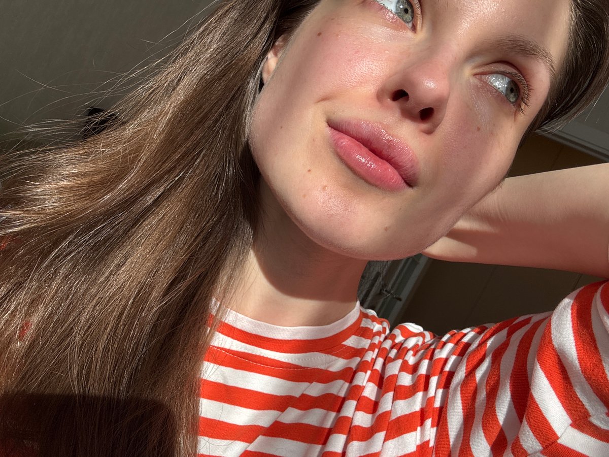 Person in striped shirt photographed indoors in Moscow residence