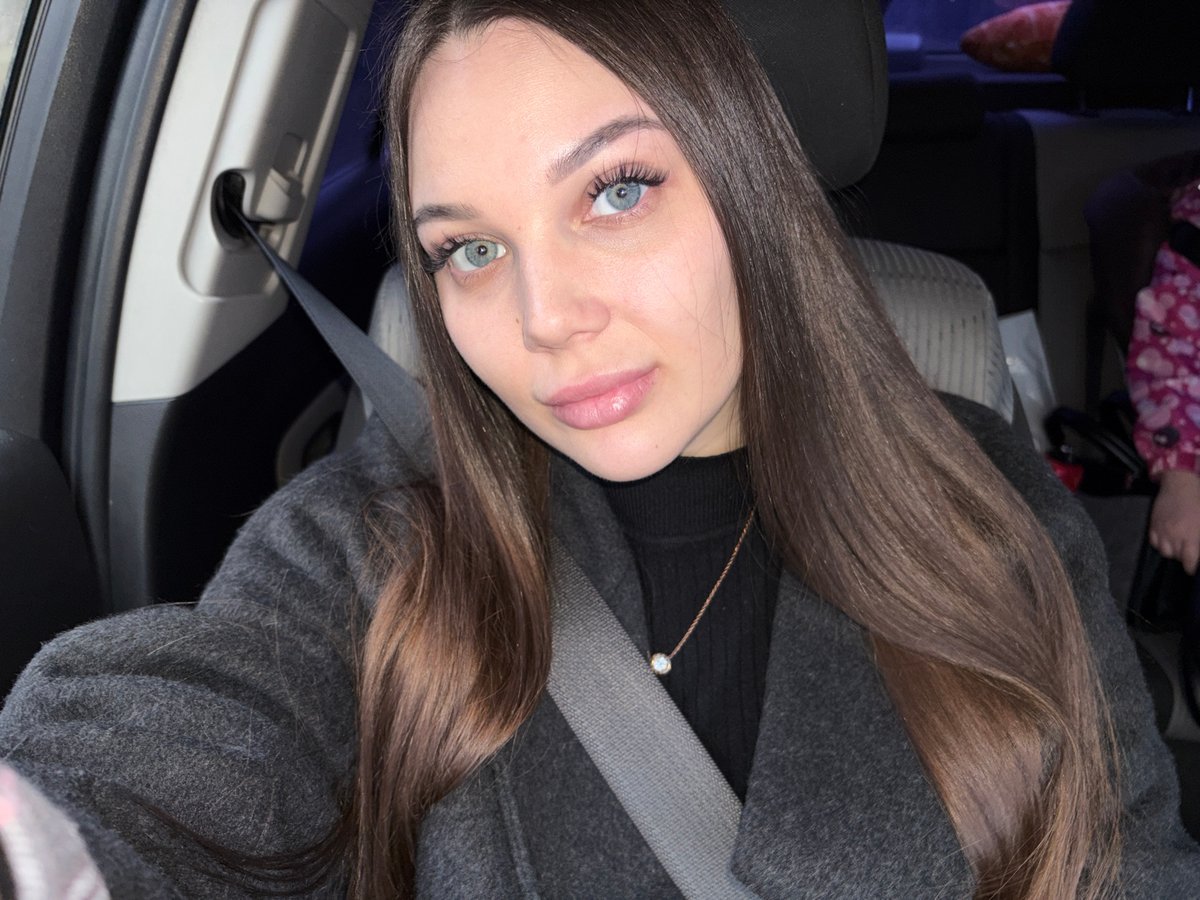 Woman observed in vehicle wearing dark coat in Chaikovsky