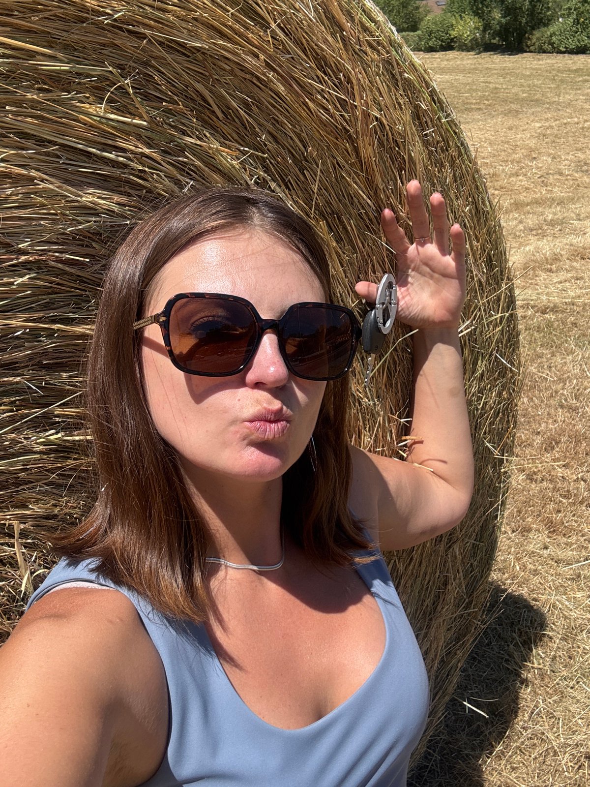 Roadside stop by hay bales in rural Jura, France
