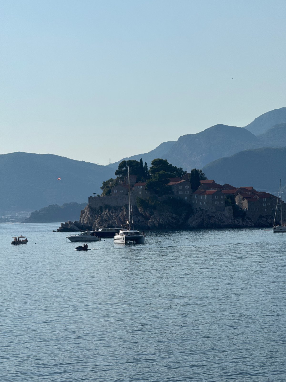 Sveti Stefan on a calm summer afternoon, sea and shore