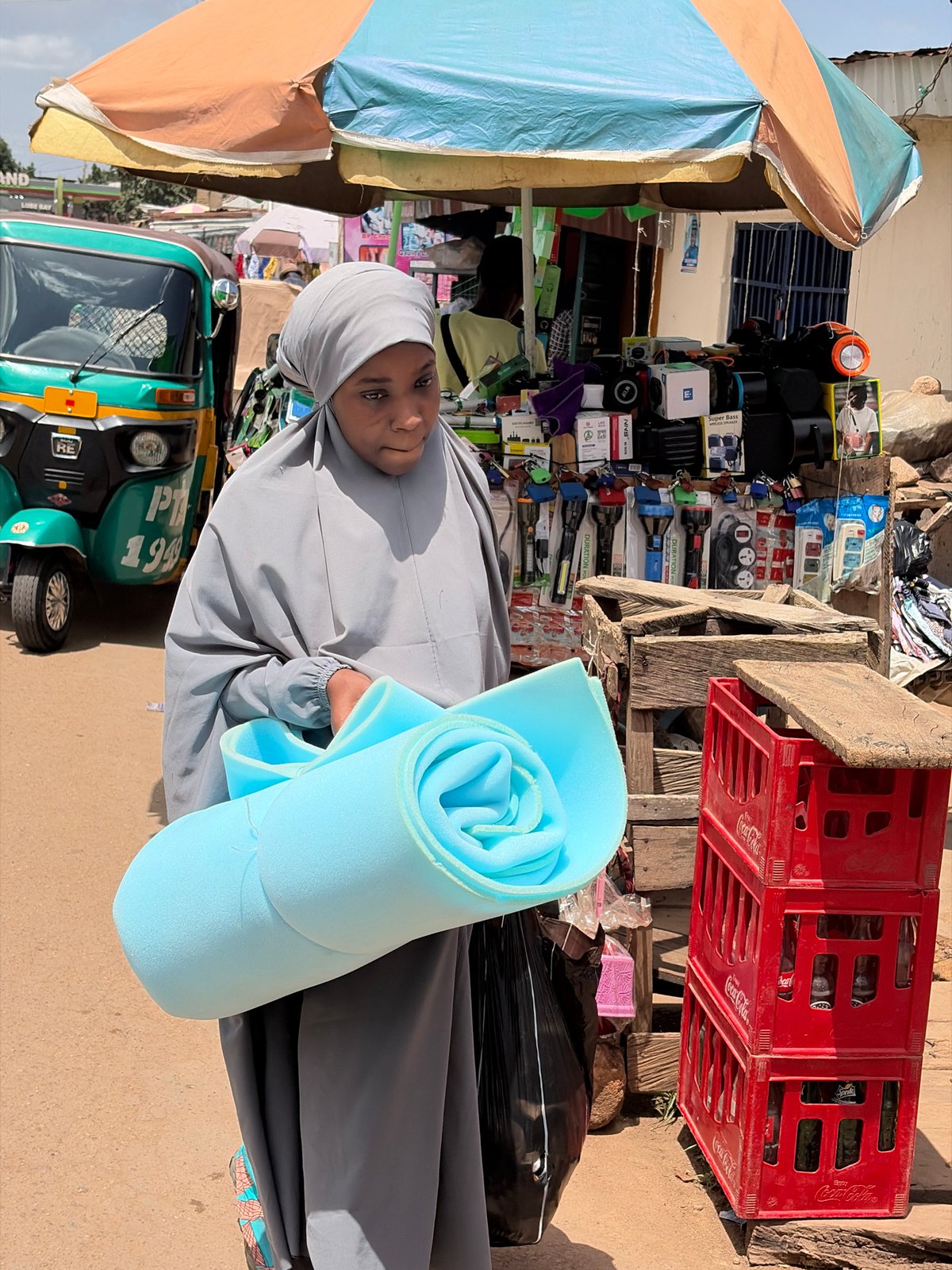 Daily life scenes captured across Jos, Nigeria markets and streets
