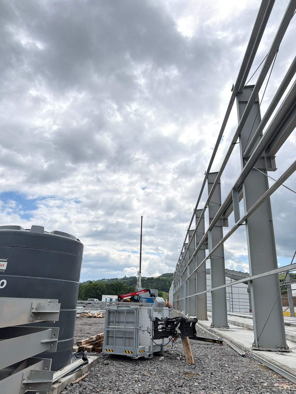 Construction work documented at Polish building site during morning hours