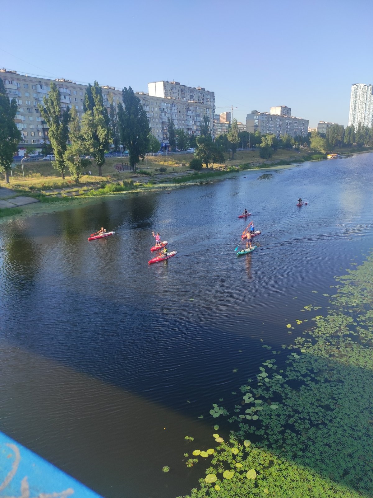 Kyiv riverside and streets on a sunny summer afternoon