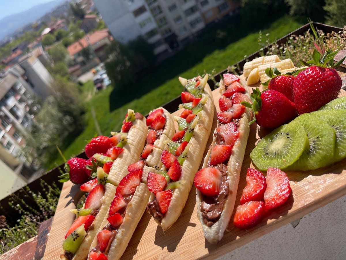 Sofia resident documents homemade banana boat desserts on sunny afternoon